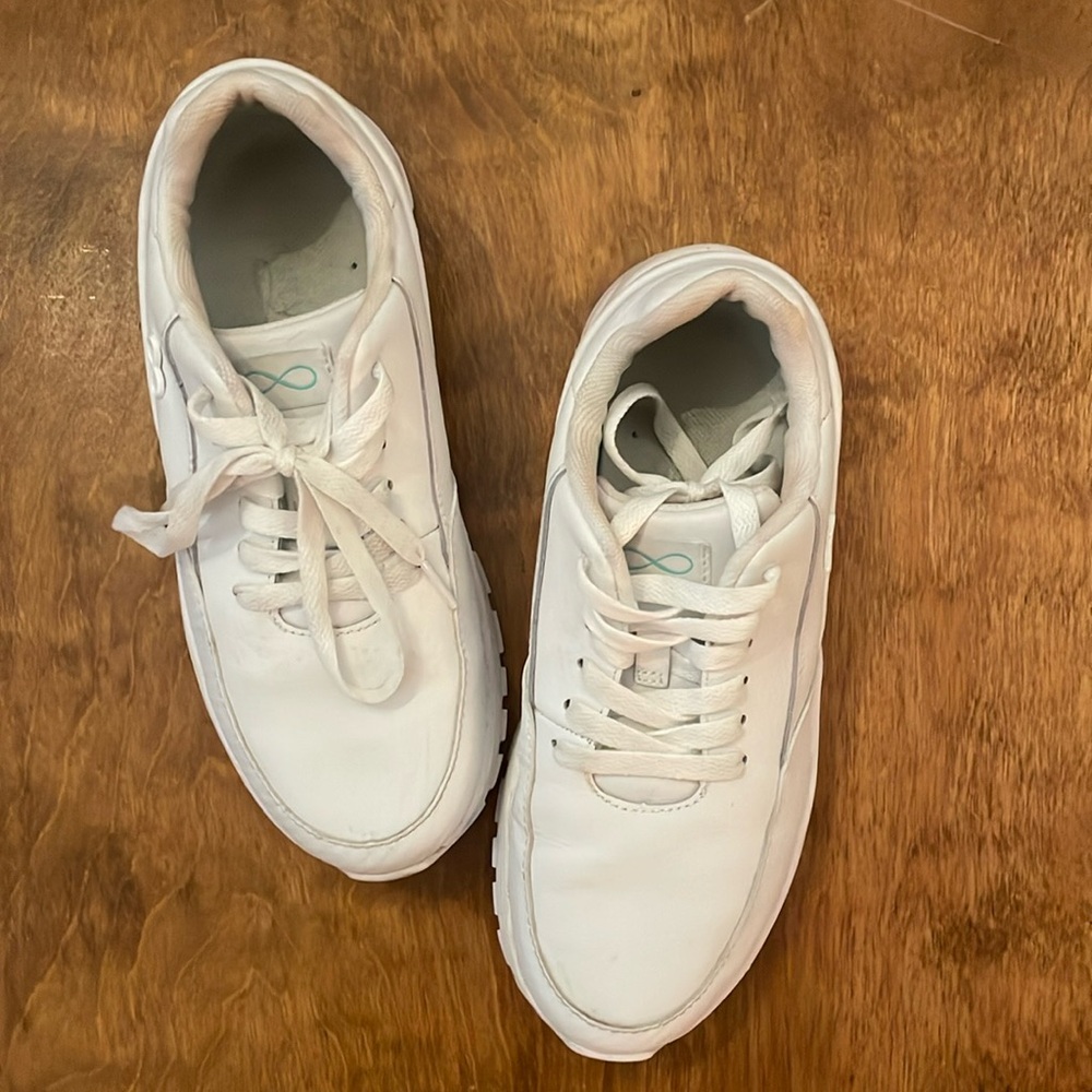White NFINITY cheer sneakers
